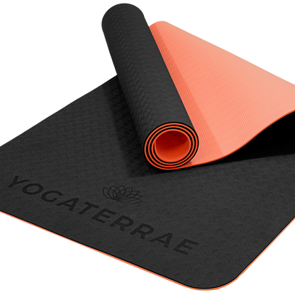 Tapis de yoga antidérapant écologique réversible Noir et Corail en TPE recyclable, sans PVC, léger avec double relief des deux côtés.
