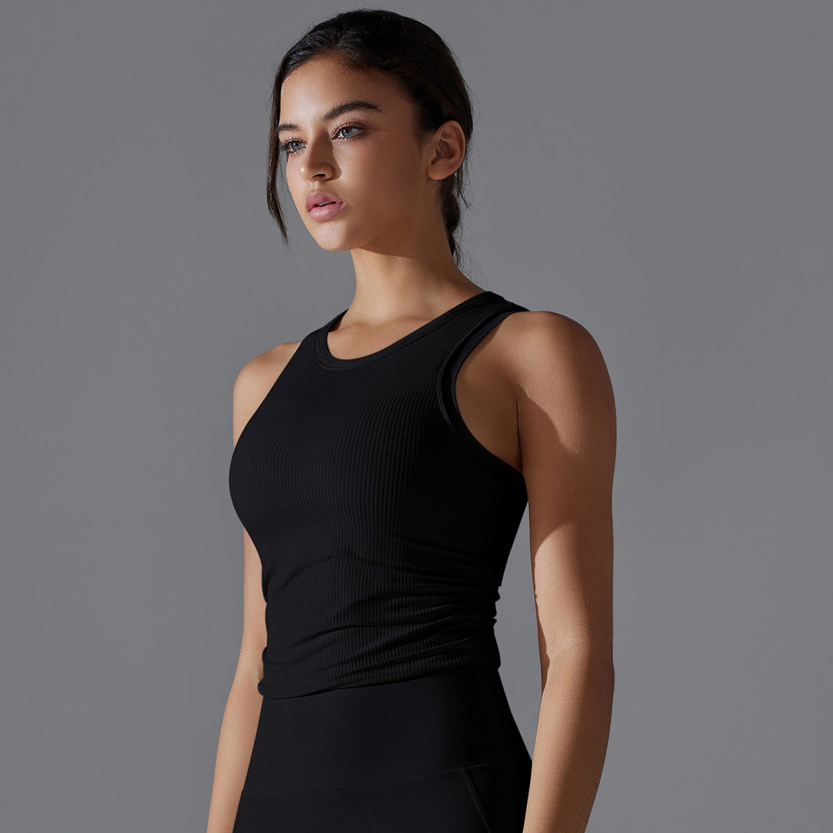BRASSIÈRE DE SPORT CÔTELÉE NOIRE CONFORT ÉLÉGANCE ATHLEISURE