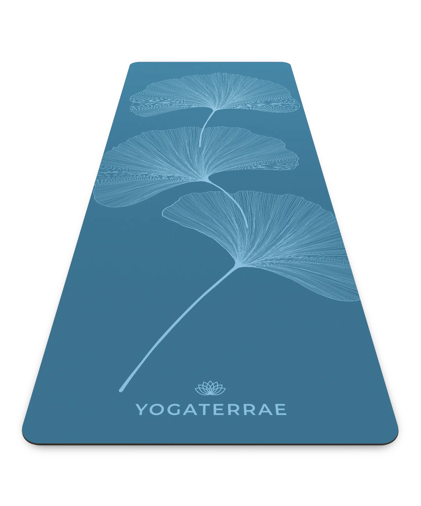 Tapis de yoga technique Yogaterrae en PU et caoutchouc naturel, coloris Bleu Polaire avec impression "Light" des feuilles de Ginkgo Biloba en perspective
