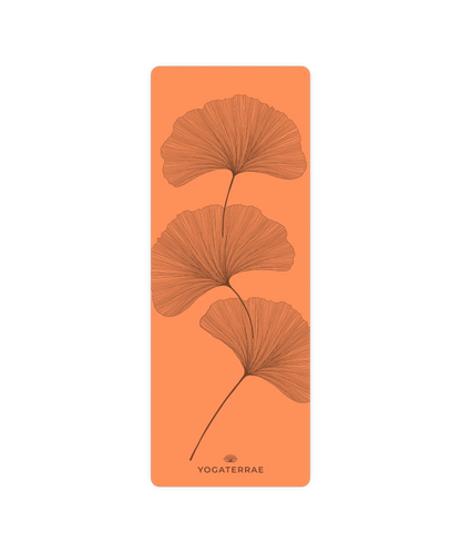 Design YinYang et feuilles de Ginkgo contrastées sur tapis de yoga Sunset Yogaterrae, revêtement polyuréthane et base caoutchouc naturel
