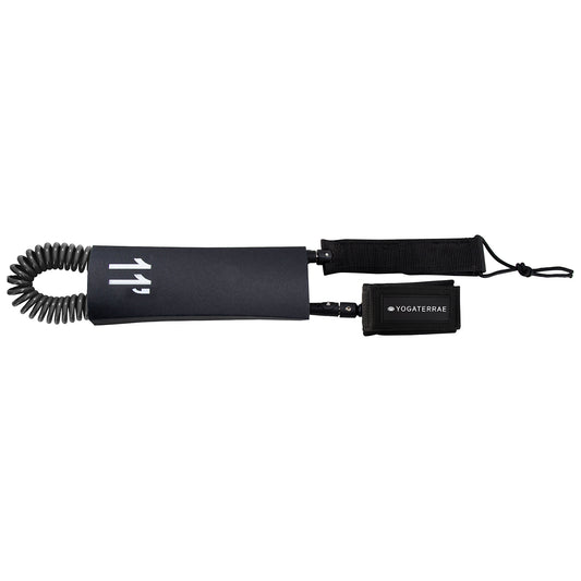 "Yogaterrae black spiral safety leash for SUP ensuring the user's safety by keeping the board close by"