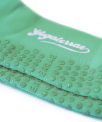 Calcetines antideslizantes para mujer con rayas en contraste, verdes